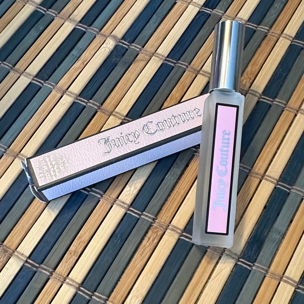 Juicy Couture NIB, Eau De Parfume rollerball.   .33fl oz